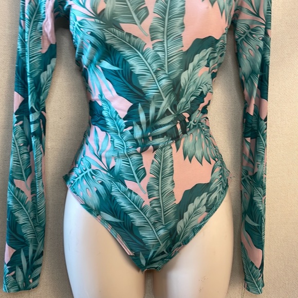 be the center of attention in this stunning sheer/floral print bodysuit - Picture 4 of 7